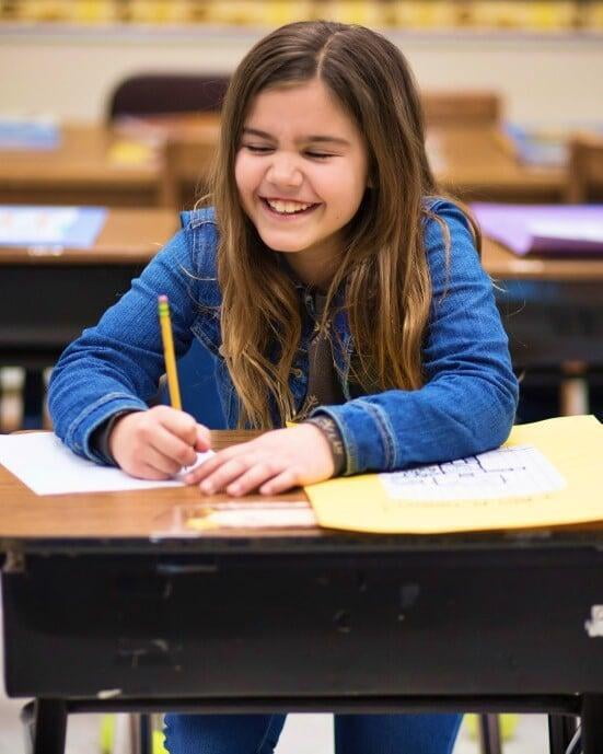 girl smiling at school